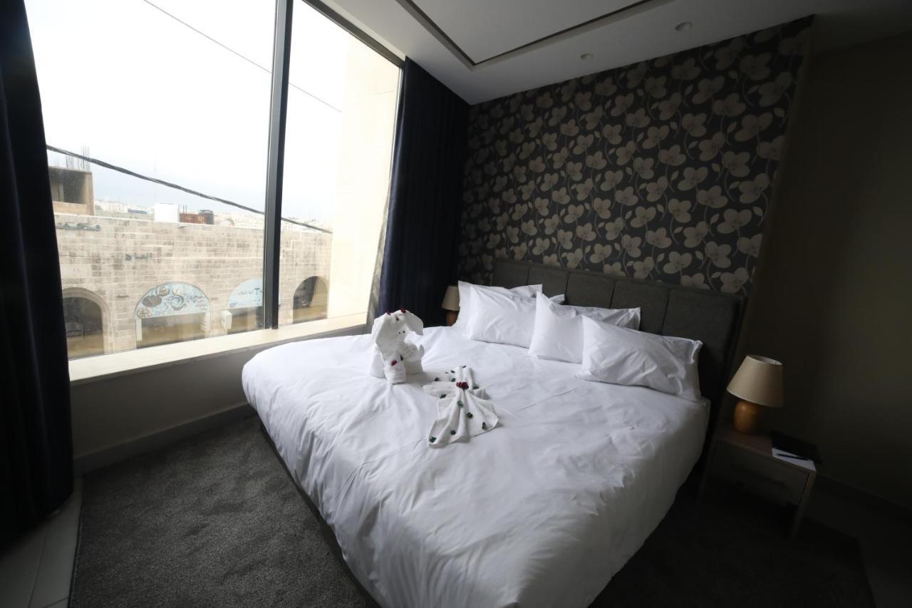 فندق صحارى الخليج Sahara Gulf Hotel Apartments อัมมาน ภายนอก รูปภาพ