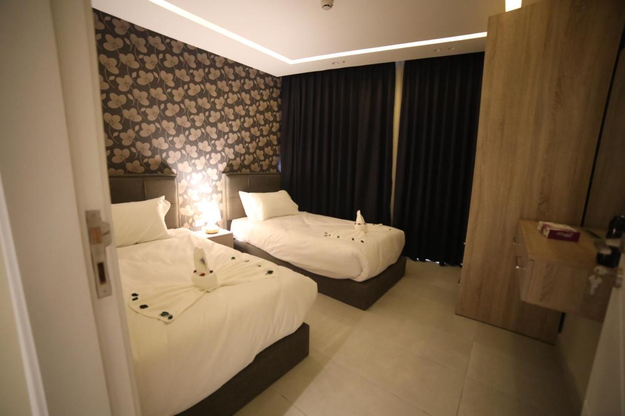 فندق صحارى الخليج Sahara Gulf Hotel Apartments อัมมาน ภายนอก รูปภาพ