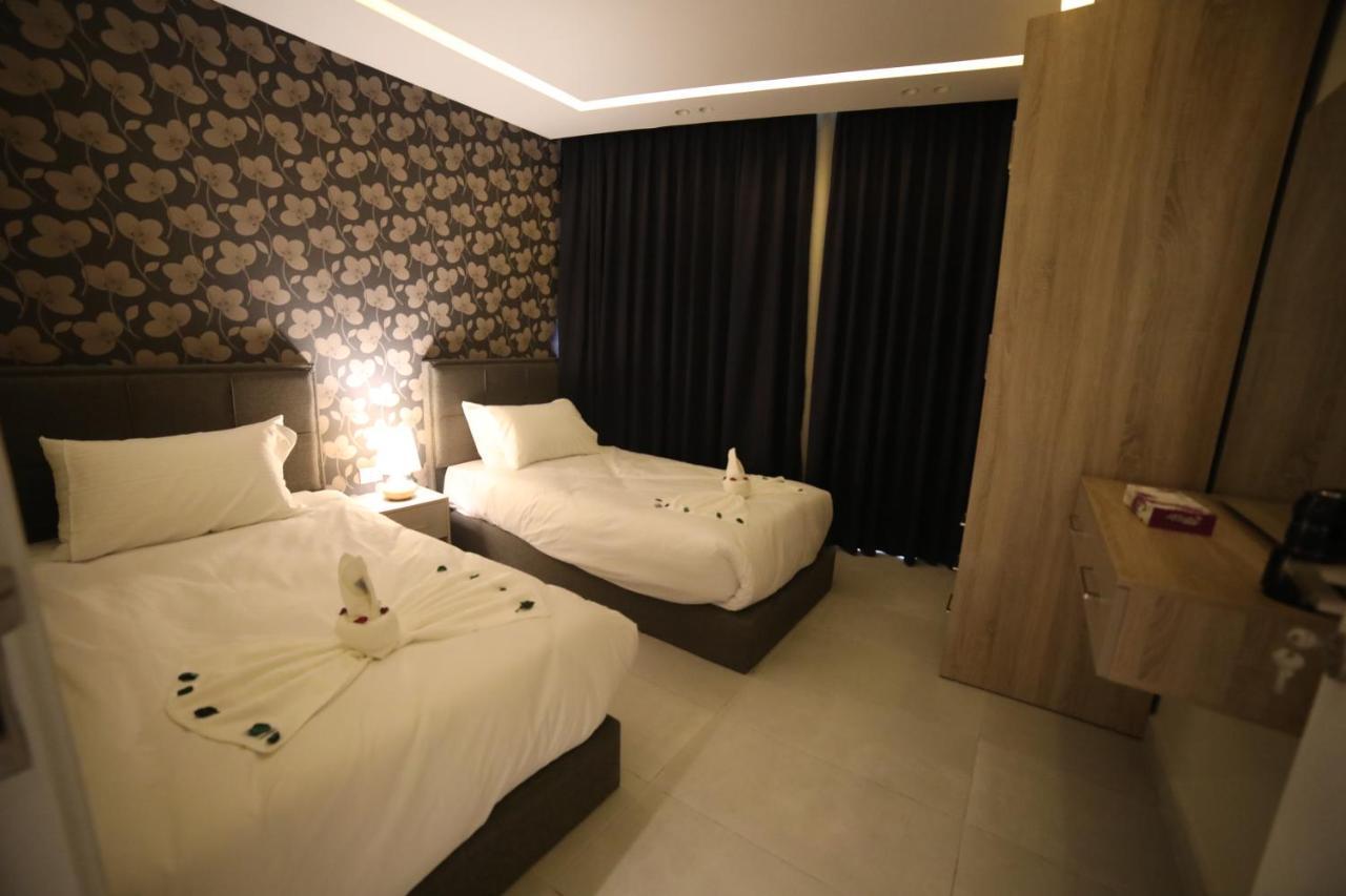 فندق صحارى الخليج Sahara Gulf Hotel Apartments อัมมาน ภายนอก รูปภาพ